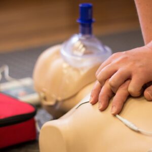 Closeup shot of the CPR practice on the mannequin